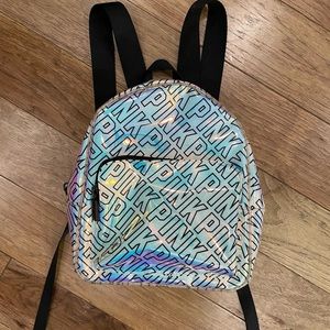 Pink by Victoria Secret mini backpack. Iridescent monogram pattern.